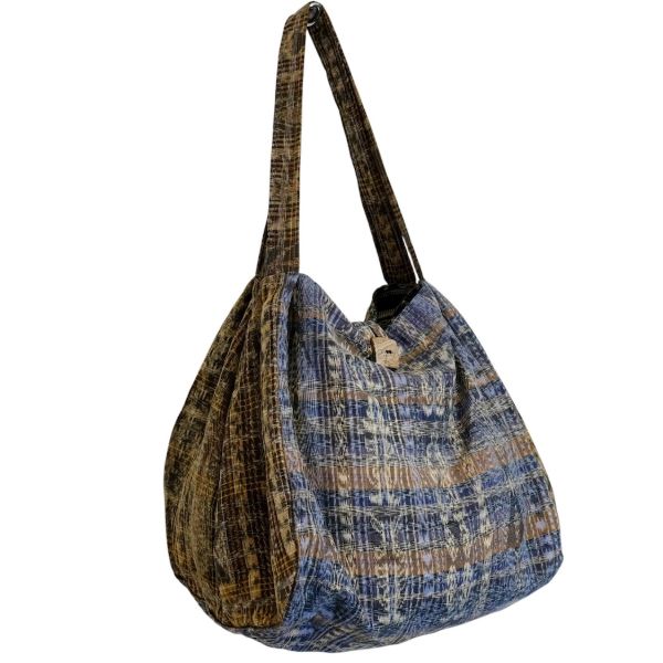 Corte Slouchy Expandable Travel Bag