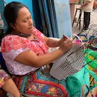Weaving a plastic basket in rural Guatemala