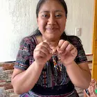 Maria beaded earrings, newly completed, in Guatemala
