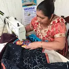 Embroidering a table runner in Guatemala